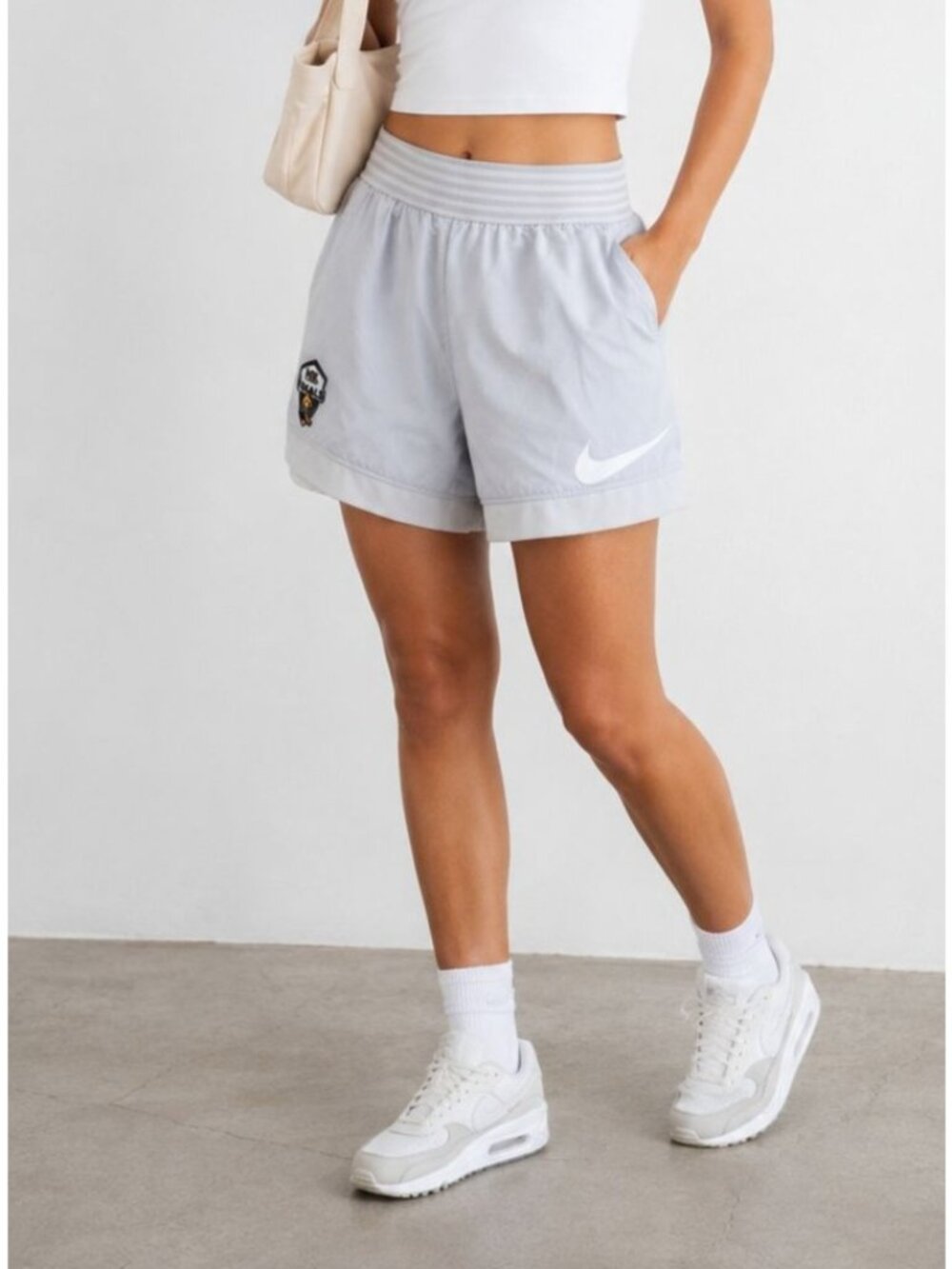Nike Light Gray Athletic Shorts with White Swoosh
